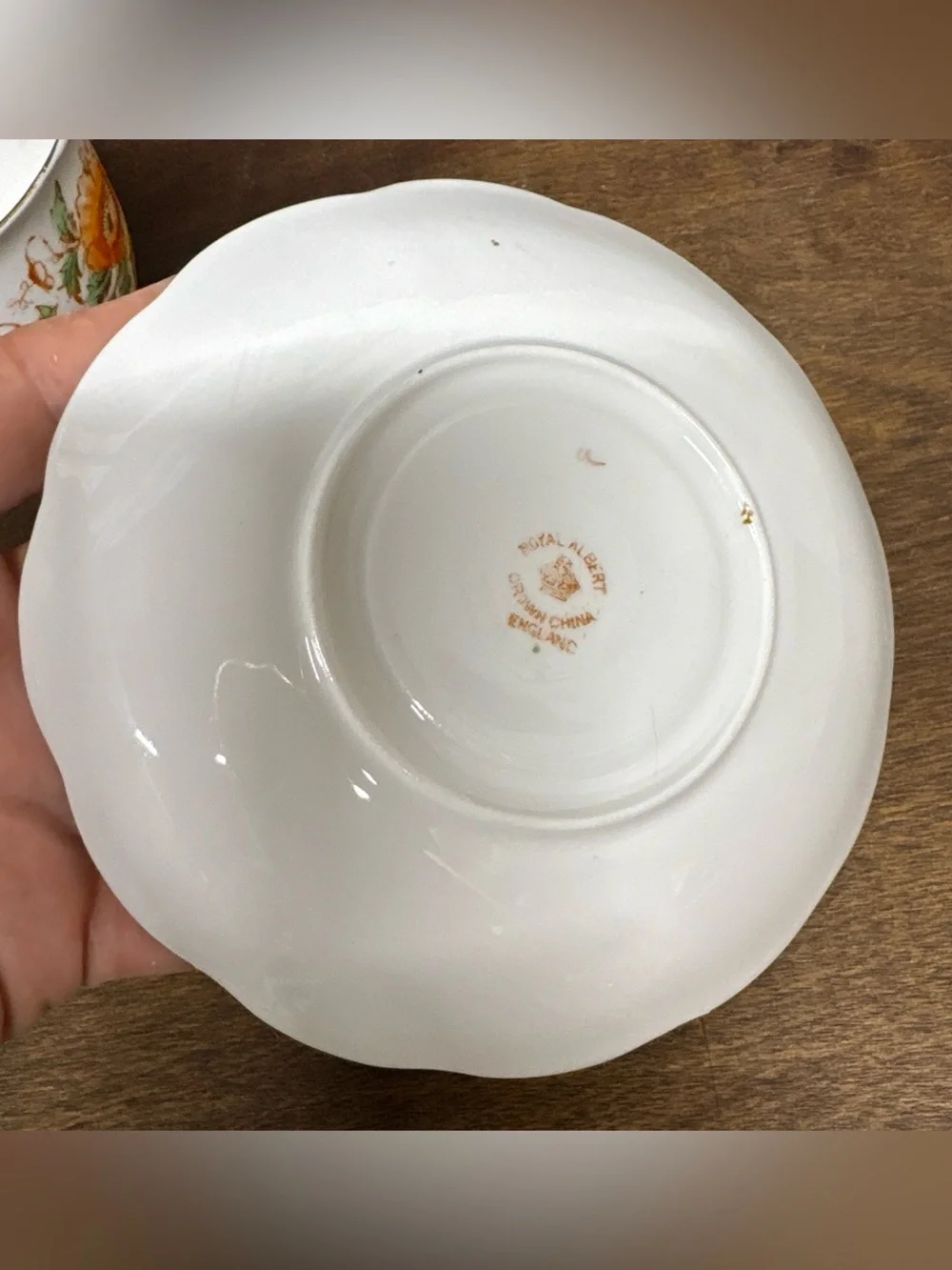 Royal Albert White Teacup and Saucer with Orange, Yellow, Pink Floral Design